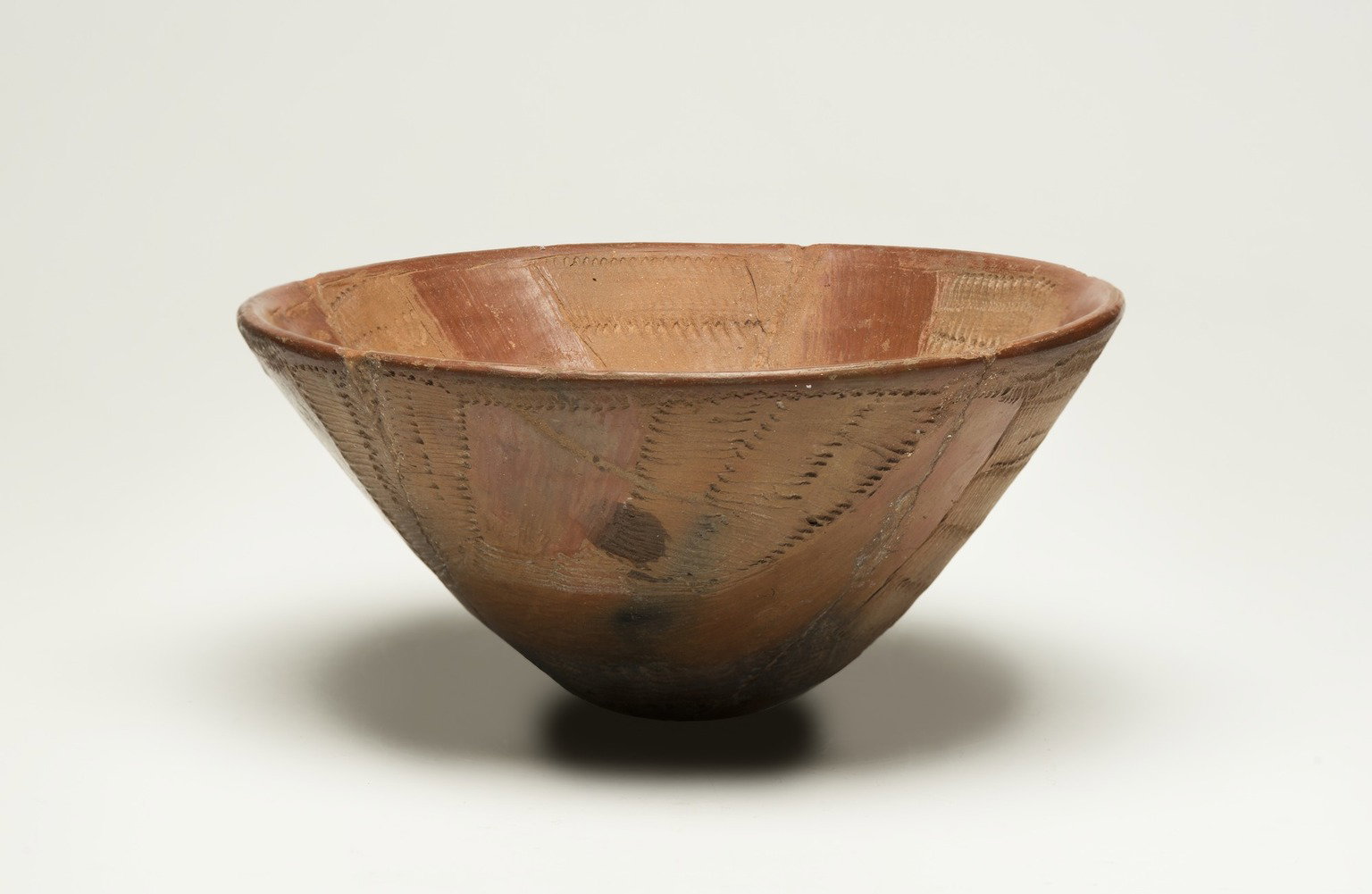 Bowl with Alternate Impressed and Red-polished Panels