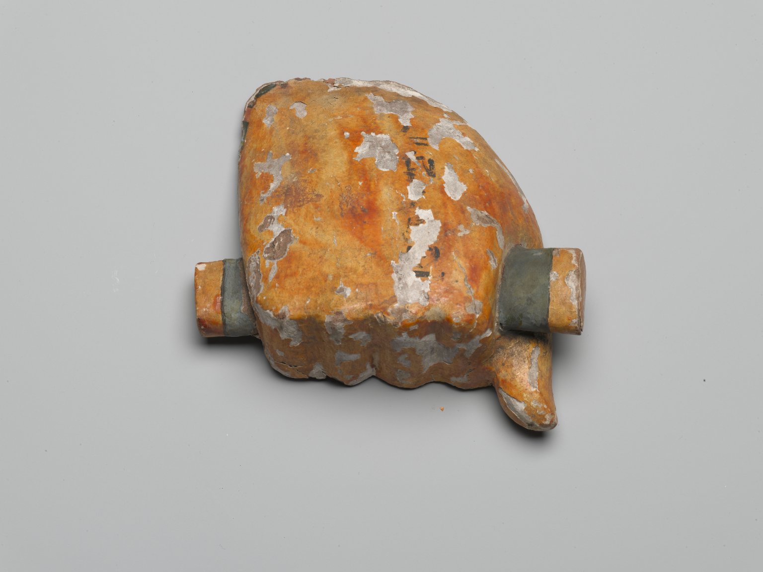 Right Fist Holding Folded Cloth