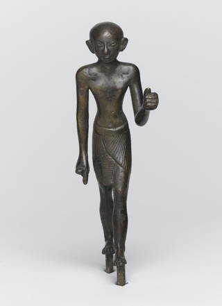 Striding Figure of a Priest