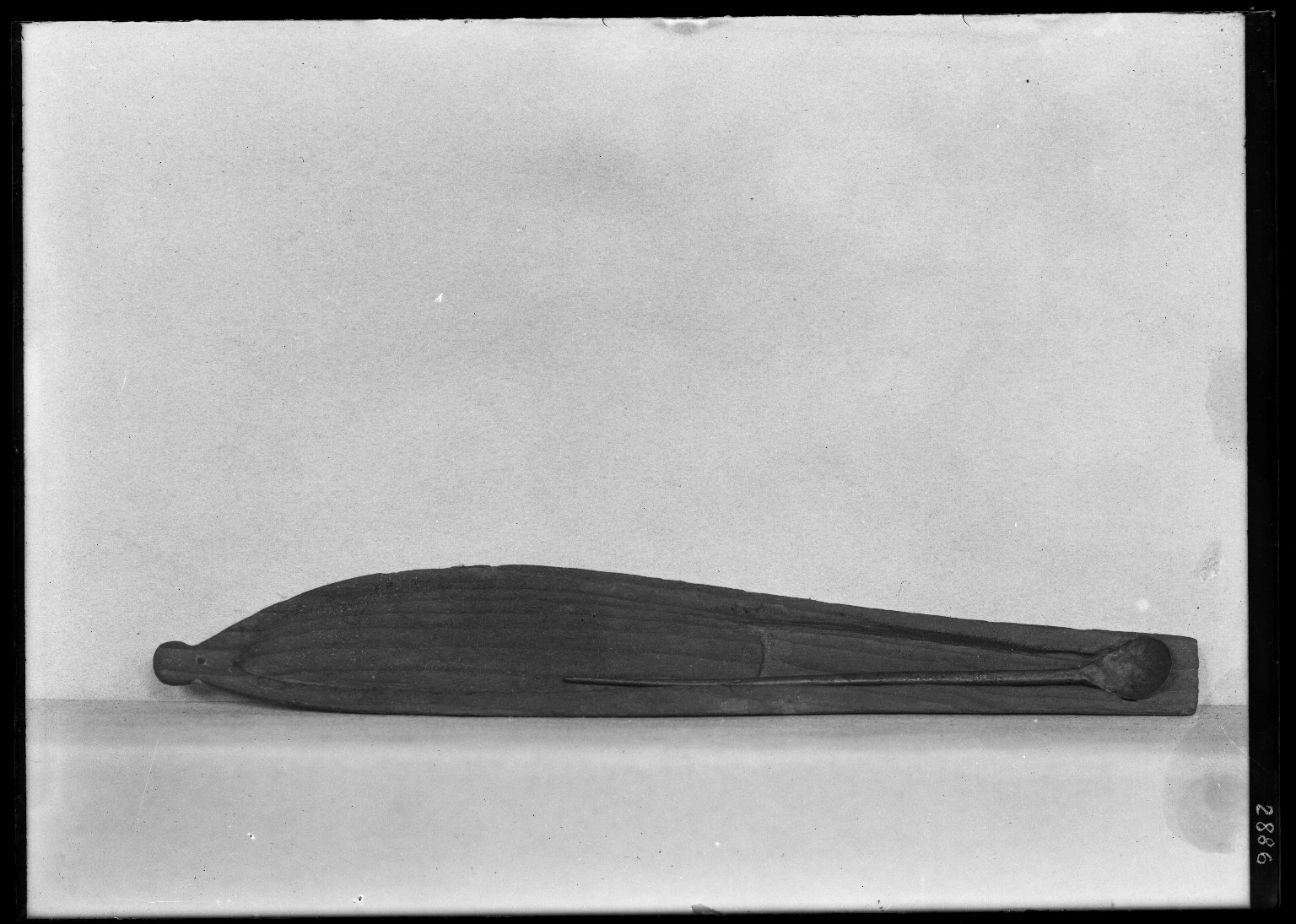 Lower Part of a Shallow Cosmetic Box Containing a Spoon
