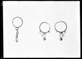 Earring with Large Circular Loop which Decends a Chain