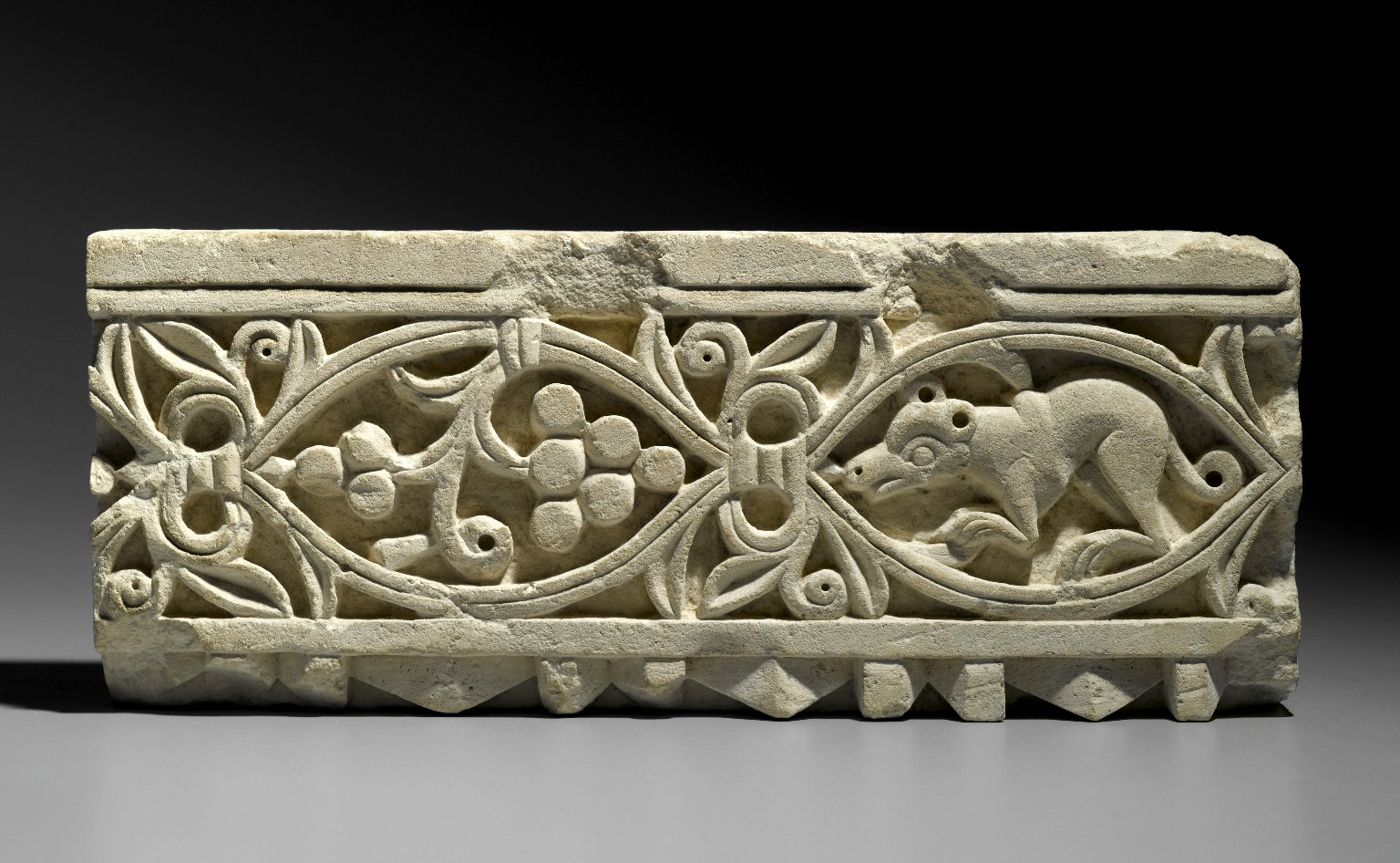 Plant Scroll Enclosing Grapes and an Animal