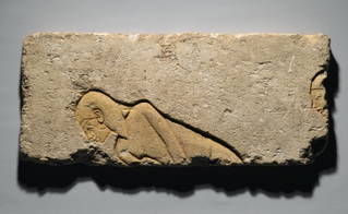 Relief of Two Men Bowing