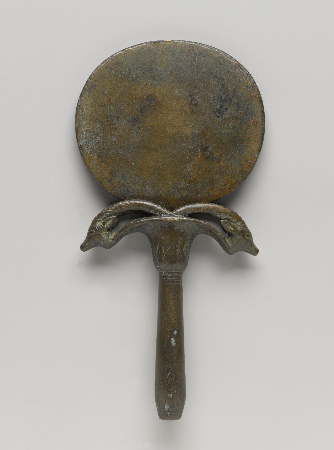 Mirror with Papyrus Handle Featuring Two Ibex Heads