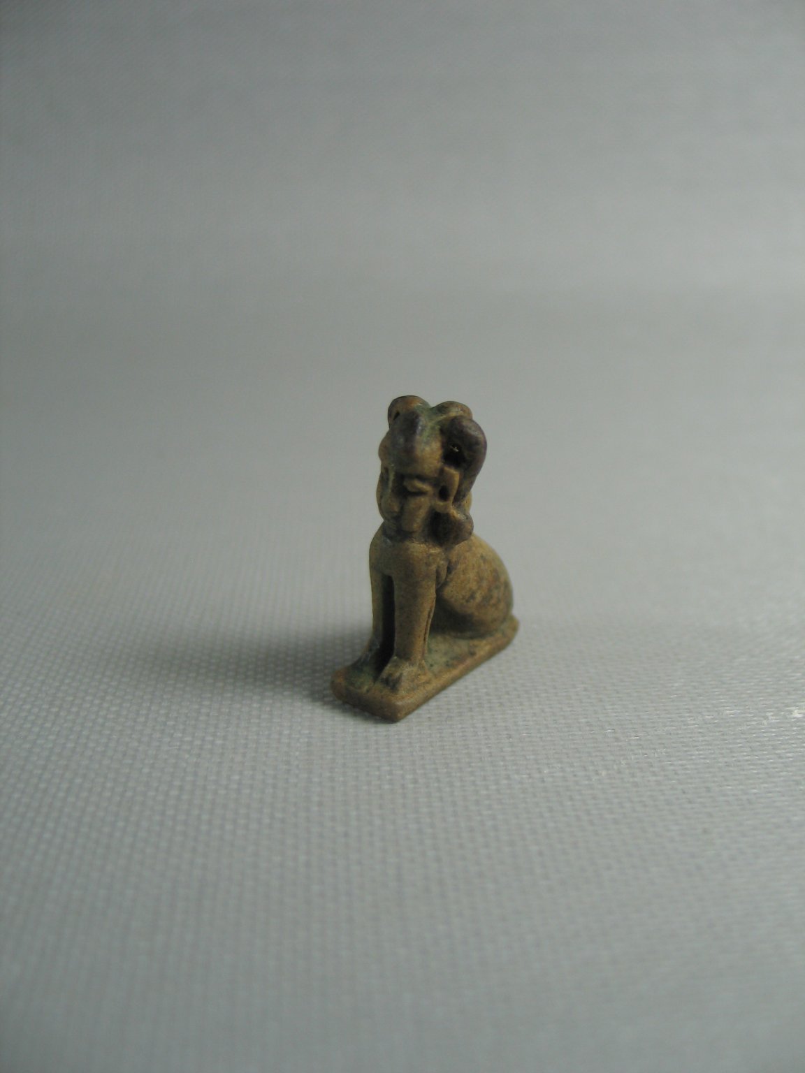 Figure of a Seated Sphinx