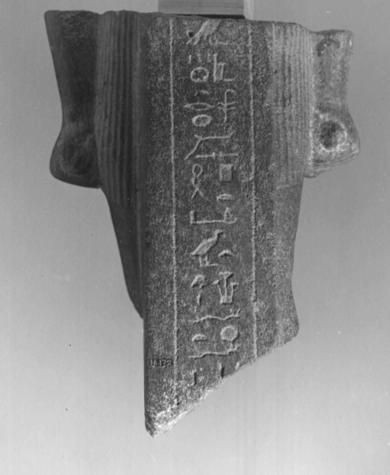 Fragment of a Standing Statue