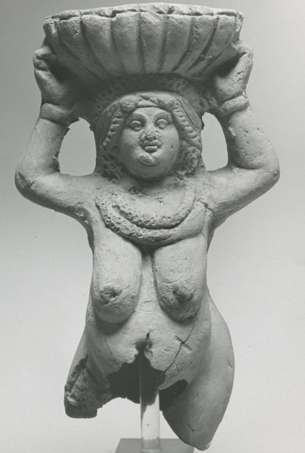 Fragmentary Statuette of a Woman
