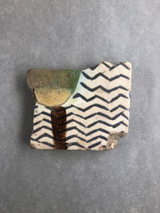 Fragment of Tile with Water Scene