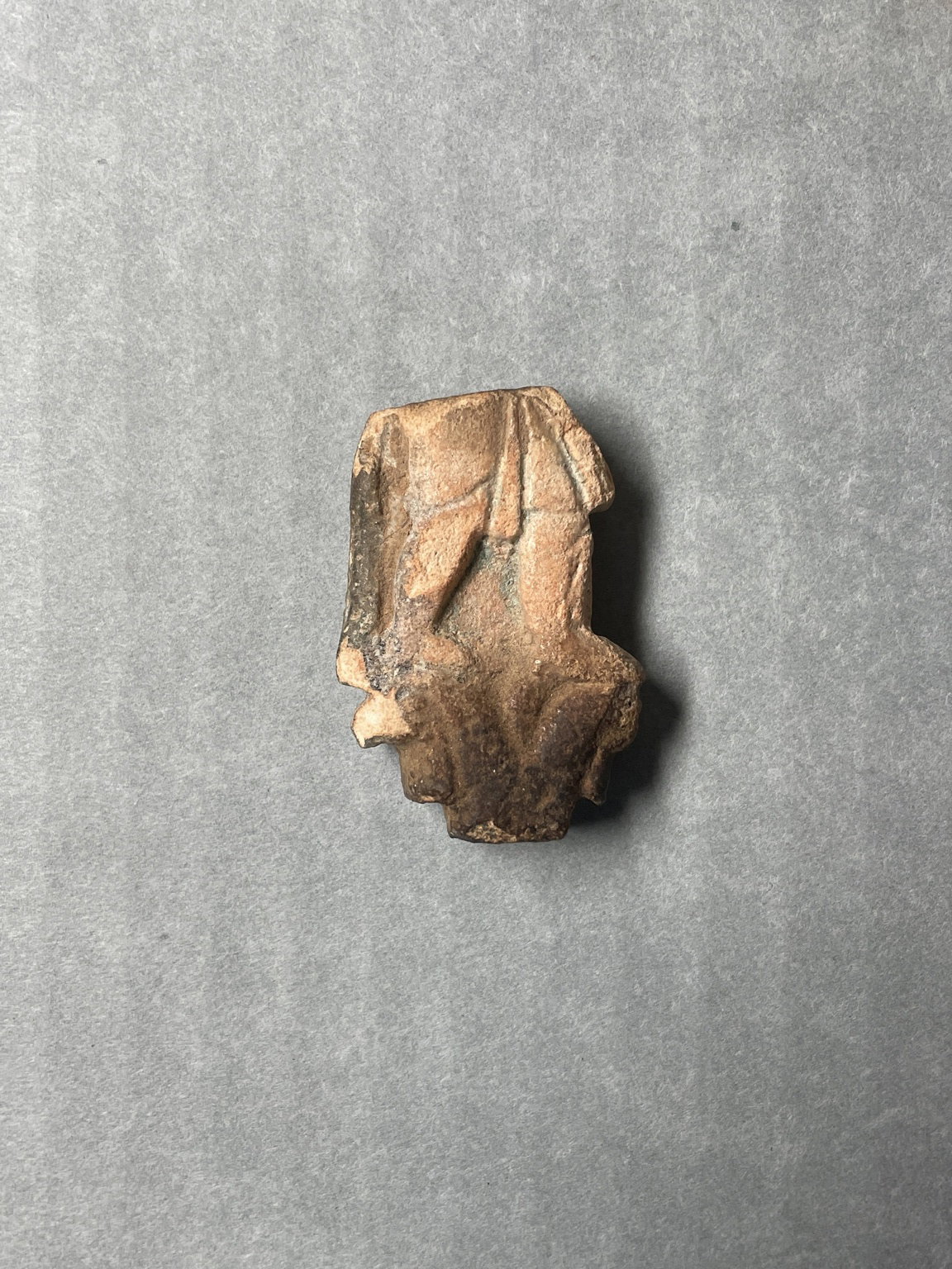 Fragment Relief Plaque, Feet of Man Above Flower