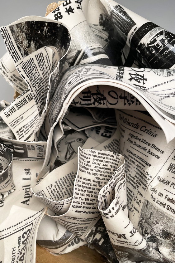 Sculpture of charcoal box filled with newspaper · Brooklyn Museum