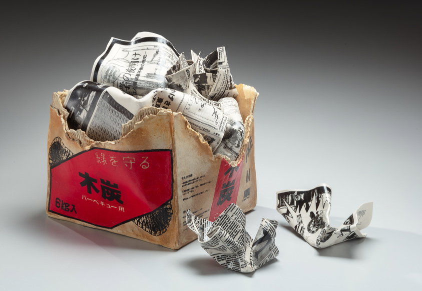 Sculpture of charcoal box filled with newspaper · Brooklyn Museum
