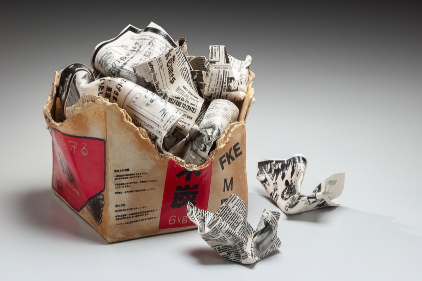 Sculpture of charcoal box filled with newspaper · Brooklyn Museum