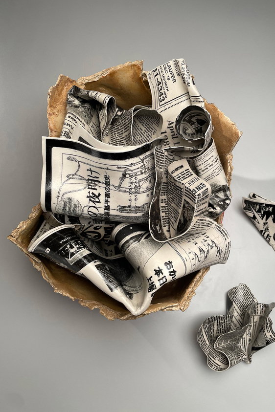 Sculpture of charcoal box filled with newspaper · Brooklyn Museum