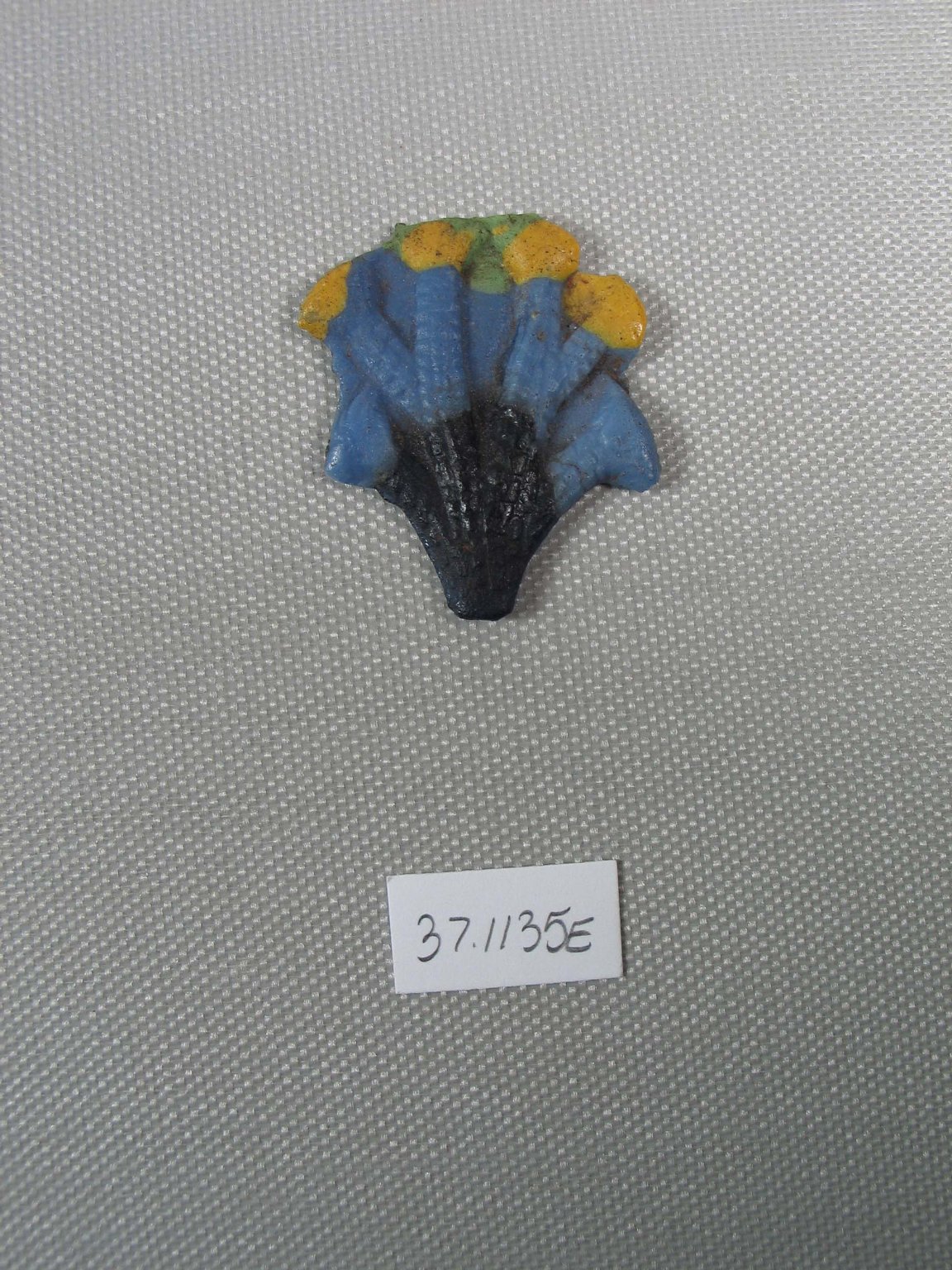 Inlay in the Form of a Flower Plant