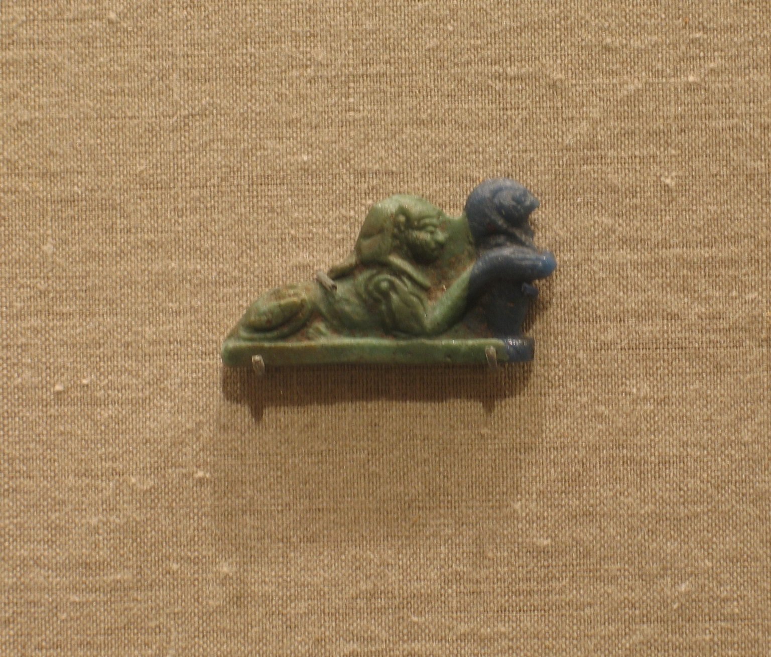 Sphinx with Falcon-Headed Vessel