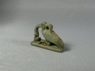 Human Before an Ibis Amulet