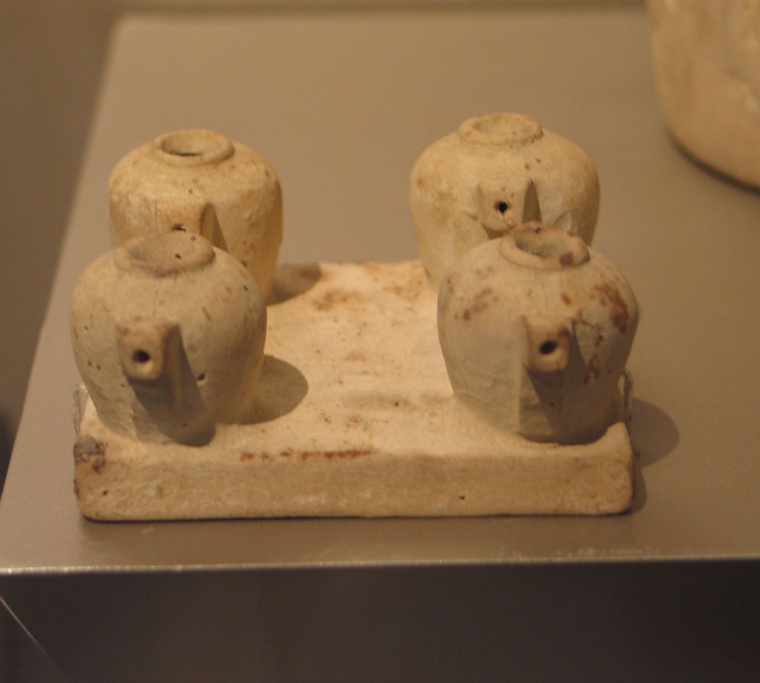 Four Model Vessels on Common Base
