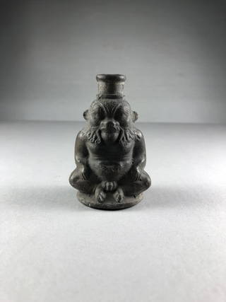 Small Bottle in the Form of the God Bes