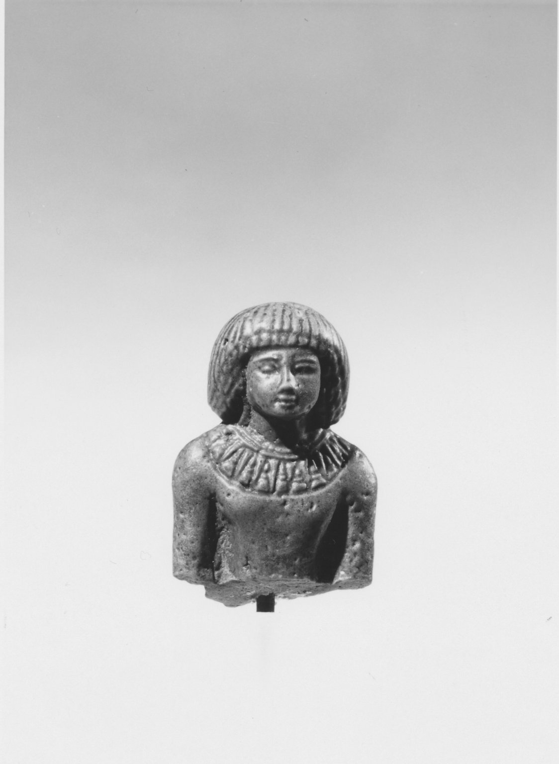 Fragmentary Statuette of a Man