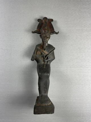 Seated Statue of Osiris Carrying a Crook and Flail