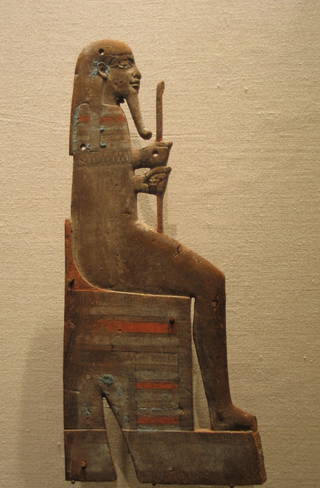 Appliqué of a Seated God